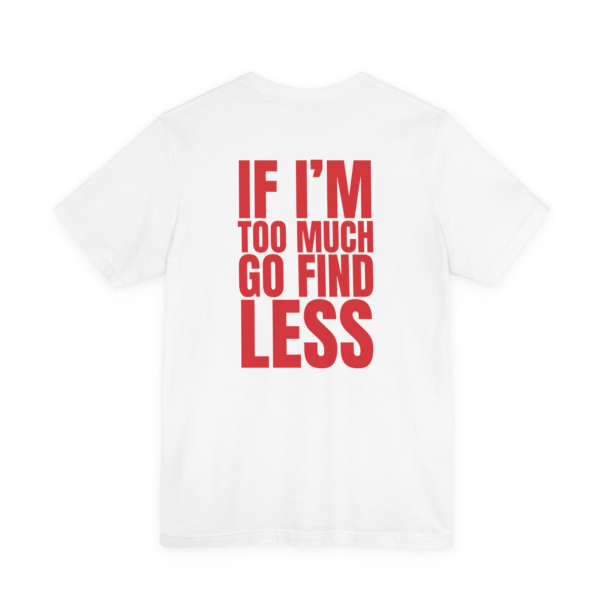 Woman from behind wearing a white oversized t shirt with "If I'm Too Much, Go Find Less" printed on the back, bold block design