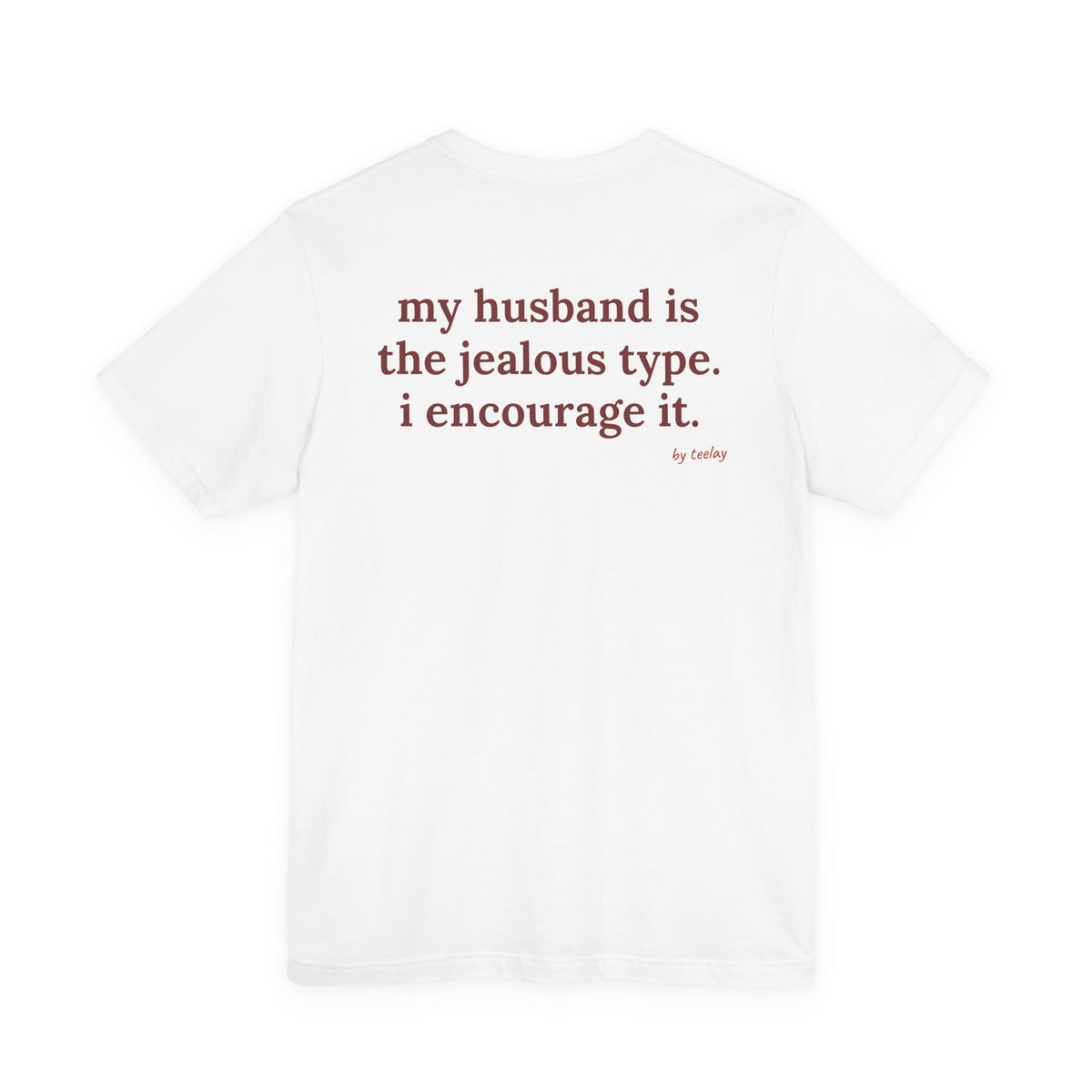 Woman from behind wearing a white oversized t shirt with "My Husband Is The Jealous Type. I Encourage It." printed on the back