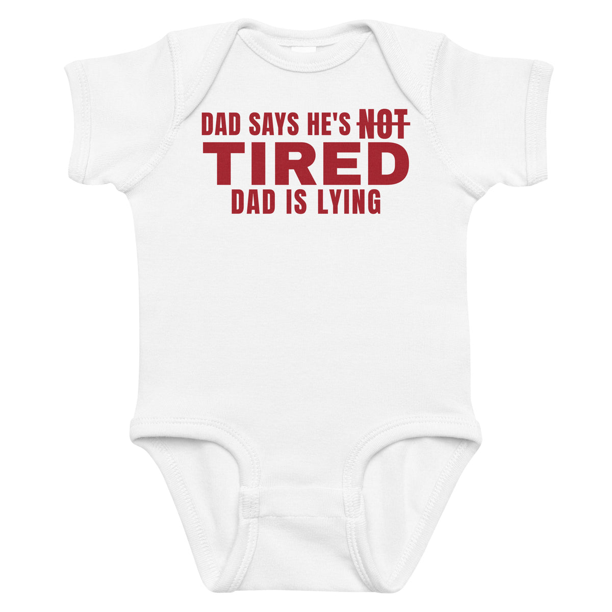 White baby bodysuit with Dad Says He's Not Tired. Dad Is Lying printed in red on the front
