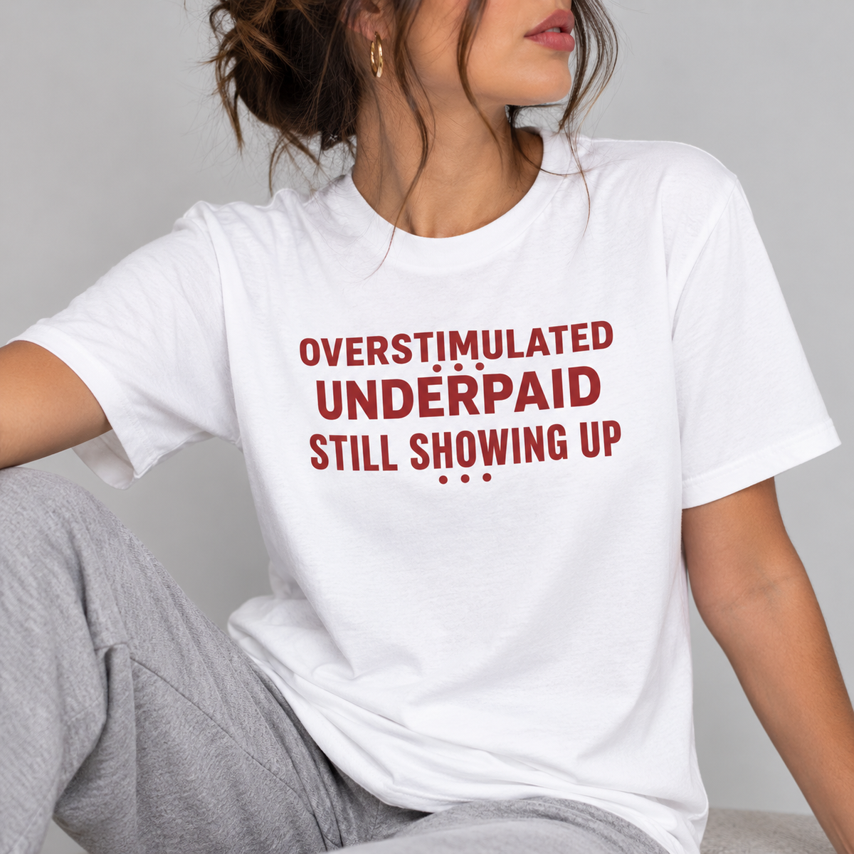 Overstimulated. Underpaid. Still Showing Up. Tee for Women