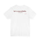 Woman from behind wearing a white oversized t shirt with "He's Unavailable. — Management" printed on the back