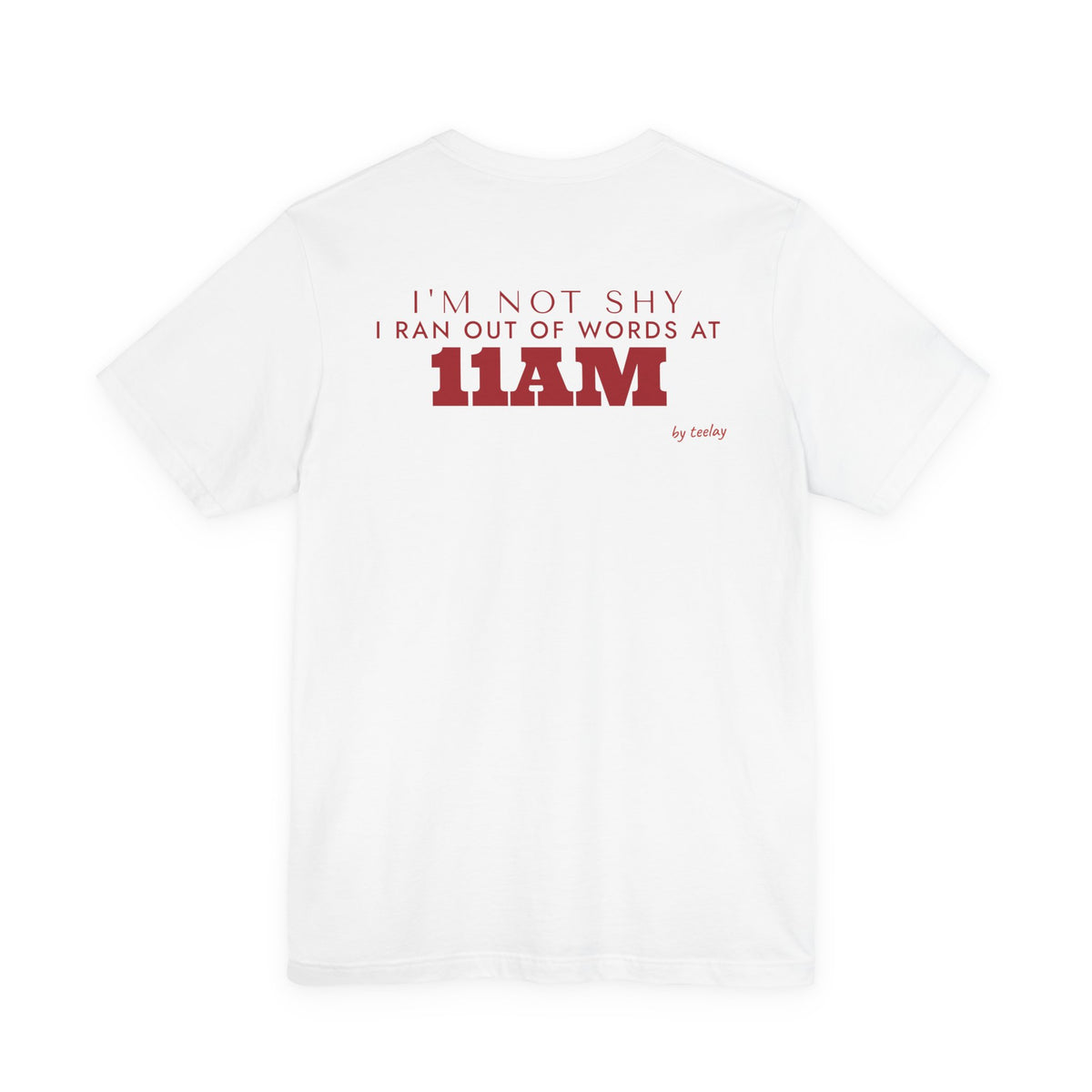 Back of a white t shirt with I'm Not Shy I Ran Out Of Words At 11AM printed in red