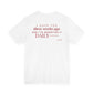 Back of a white t shirt with I Said Yes Three Weeks Ago And I've Regretted It Daily printed in red