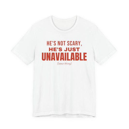 White oversized t shirt with He's Not Scary, He's Just Unavailable printed in red on the front