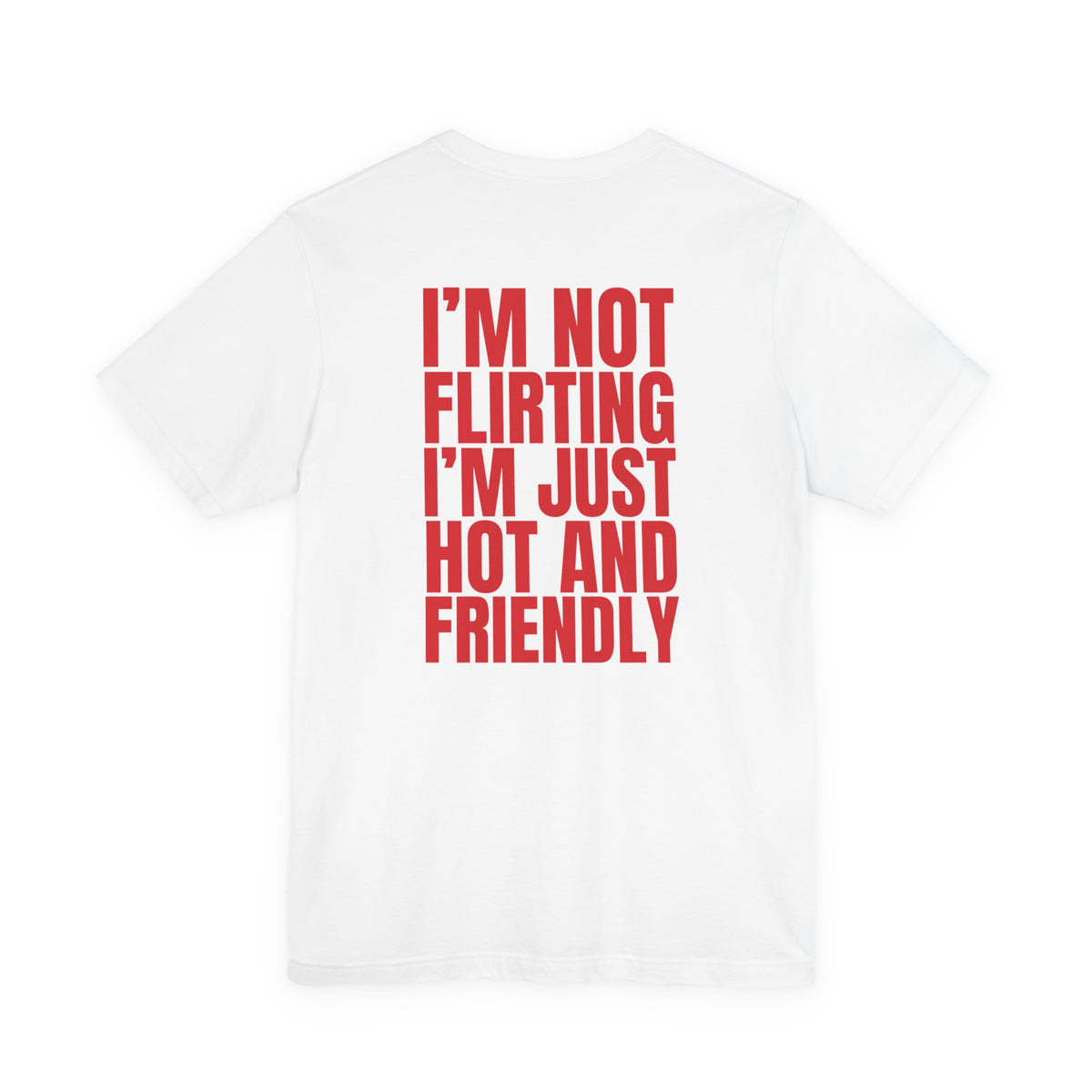 Woman from behind wearing a white oversized t shirt with "I'm Not Flirting, I'm Just Hot And Friendly" printed on the back, bold block design
