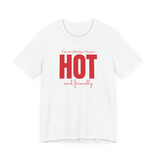 Woman wearing a white oversized t shirt with "I'm Not Flirting, I'm Just Hot And Friendly" printed on the front, big type design
