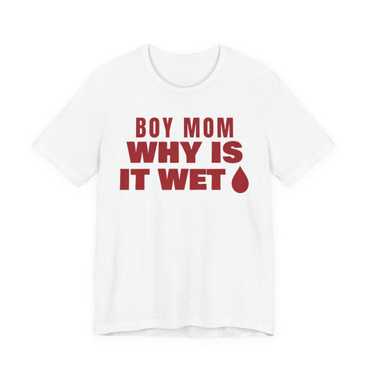 Front of a white t shirt with Boy Mom Why Is It Wet printed in red
