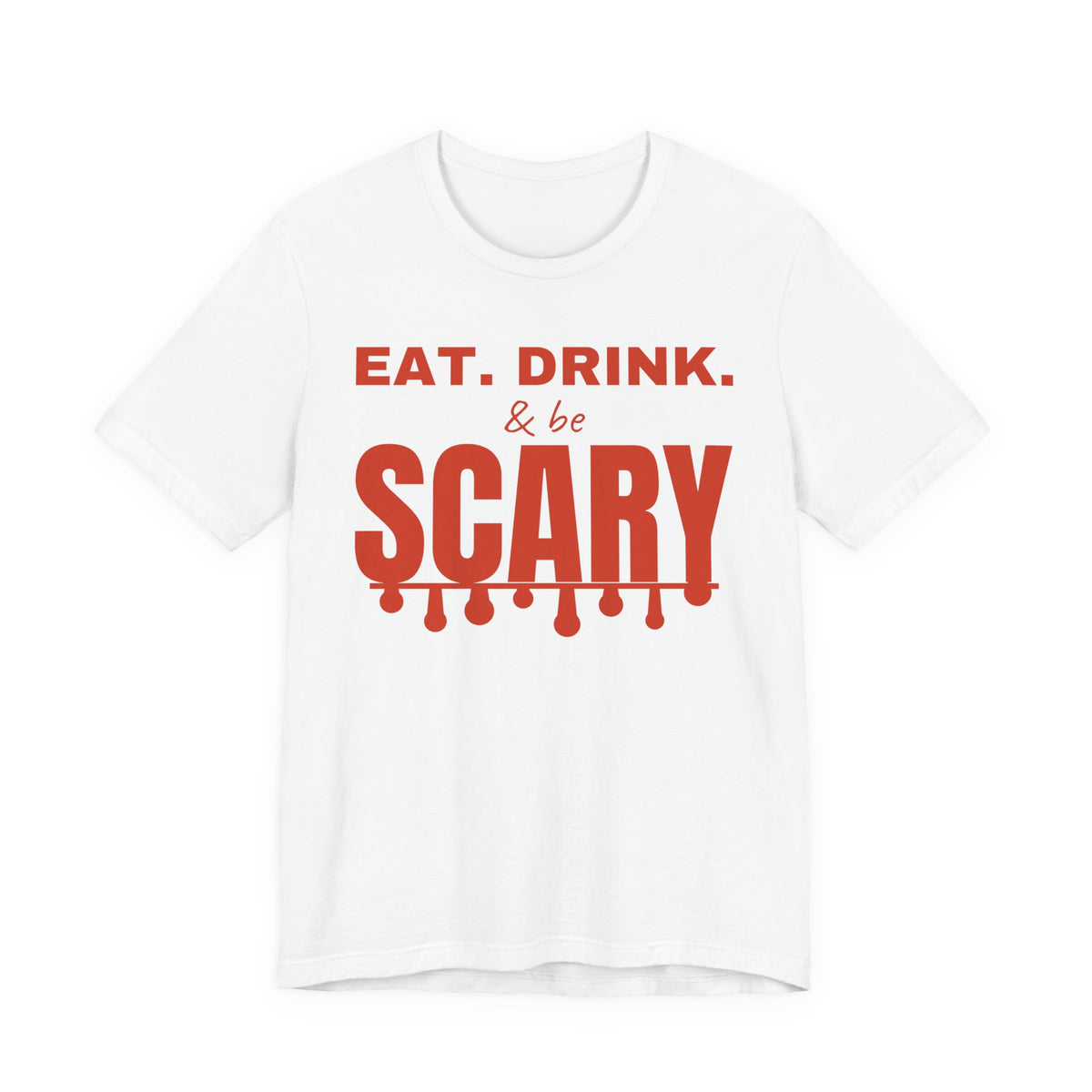 White oversized t shirt with Eat. Drink. & Be Scary printed in red on the front