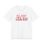 Woman wearing a white oversized t shirt with "I Don't Flirt, I'm Just Kind" printed on the front, retro 3d design