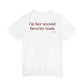 Woman from behind wearing a white oversized t shirt with "I'm Her Second Favorite Team" printed on the back