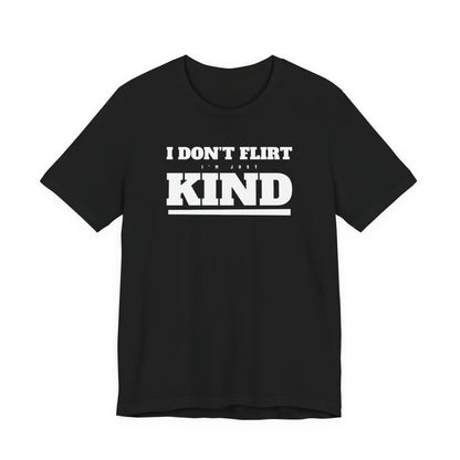 Woman wearing a black oversized t shirt with "I Don't Flirt, I'm Just Kind" printed on the front, varsity design