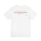 Back of a white t shirt with Another Year Of Not Being Normal About It printed in red