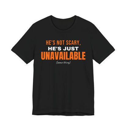 Black oversized t shirt with He's Not Scary, He's Just Unavailable printed in orange on the front