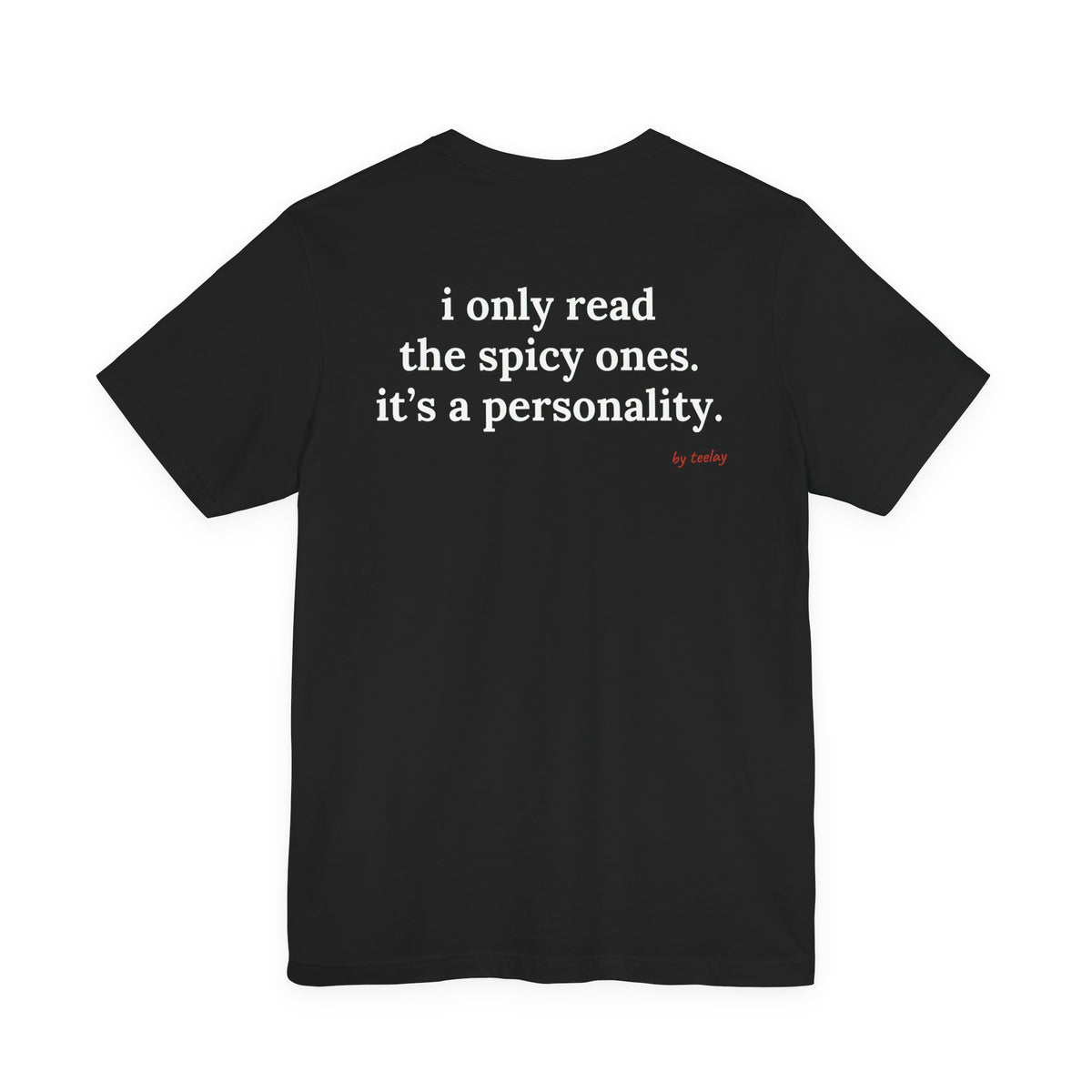 Woman from behind wearing a black oversized t shirt with "I Only Read The Spicy Ones. It's A Personality." printed on the back
