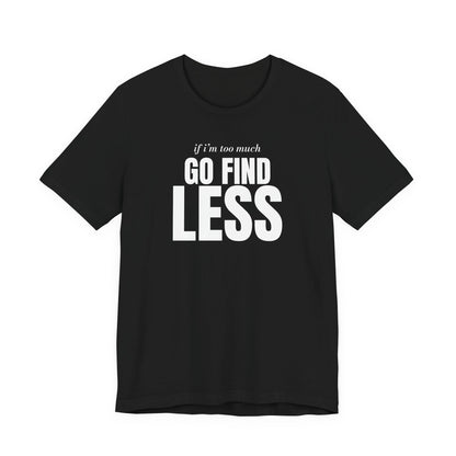 Woman wearing a black oversized t shirt with "If I'm Too Much, Go Find Less" printed on the front, big type design