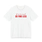 Woman wearing a white oversized t shirt with "If I'm Too Much, Go Find Less" printed on the front, script print design