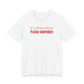 Woman wearing a white oversized t shirt with "If I'm Flirting With You, Please Cooperate" printed on the front, script print design