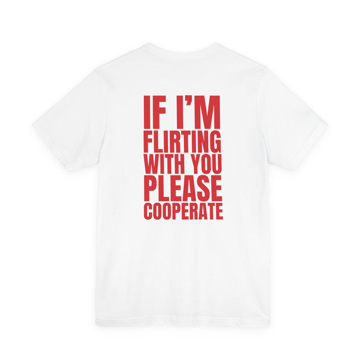 Woman from behind wearing a white oversized t shirt with "If I'm Flirting With You, Please Cooperate" printed on the back, bold block design