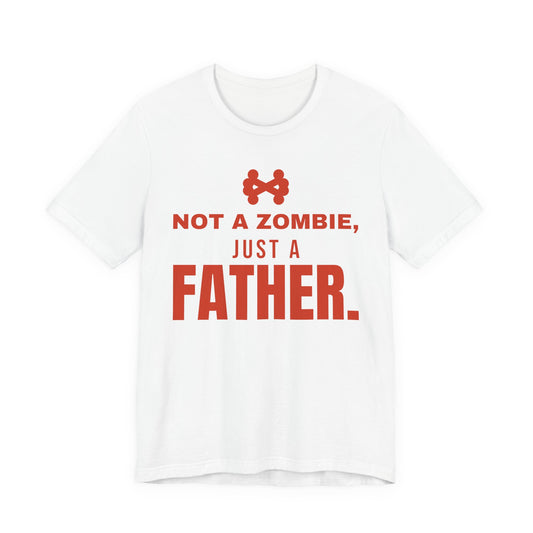 White oversized t shirt with Not A Zombie, Just A Father. printed in red on the front