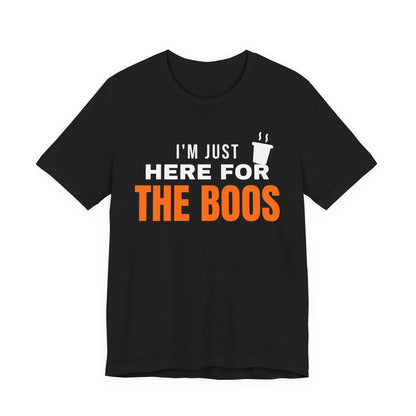 Black oversized t shirt with I'm Just Here For The Boos printed in orange on the front