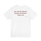 Woman from behind wearing a white oversized t shirt with "My Search History Knows Me Better Than You" printed on the back