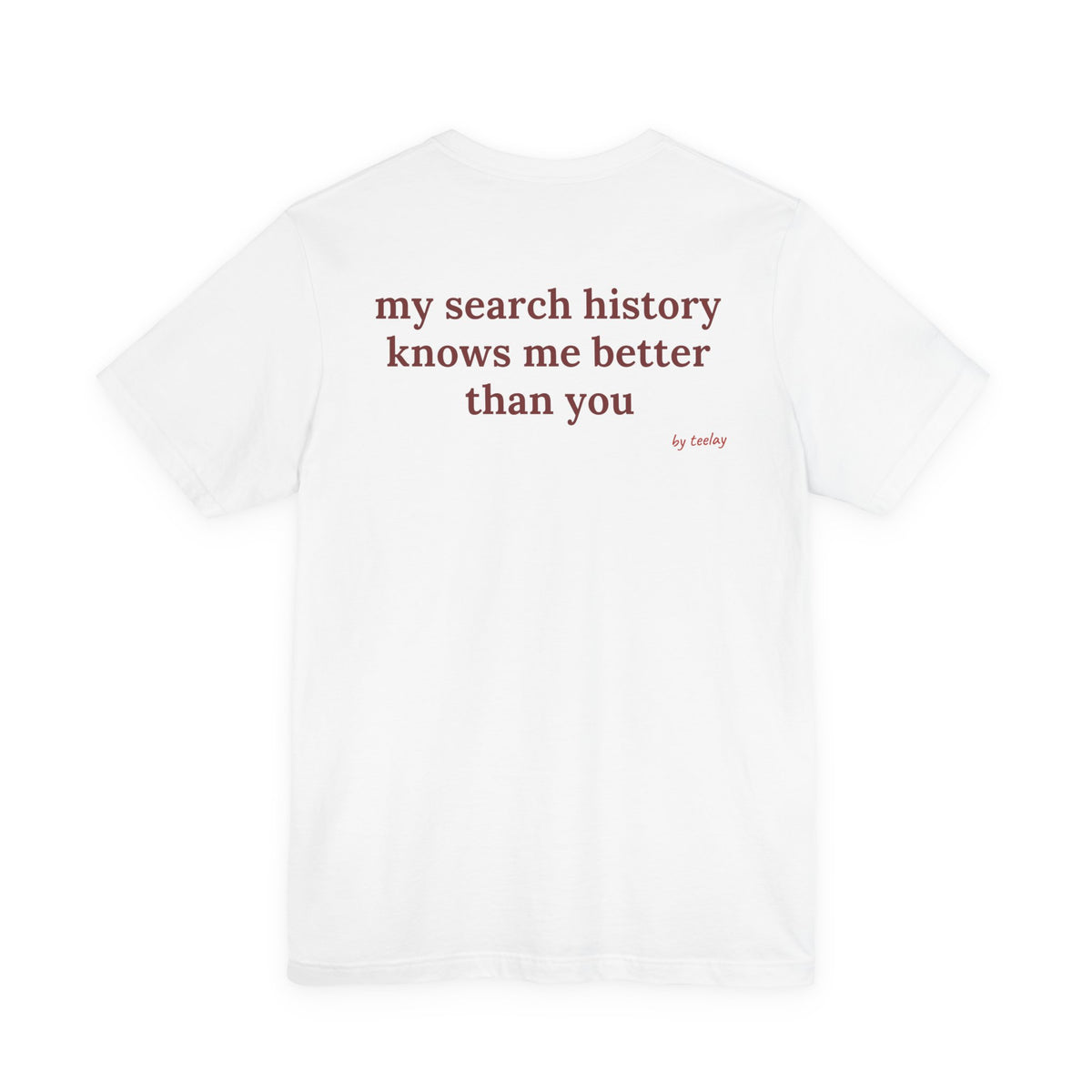 Woman from behind wearing a white oversized t shirt with "My Search History Knows Me Better Than You" printed on the back