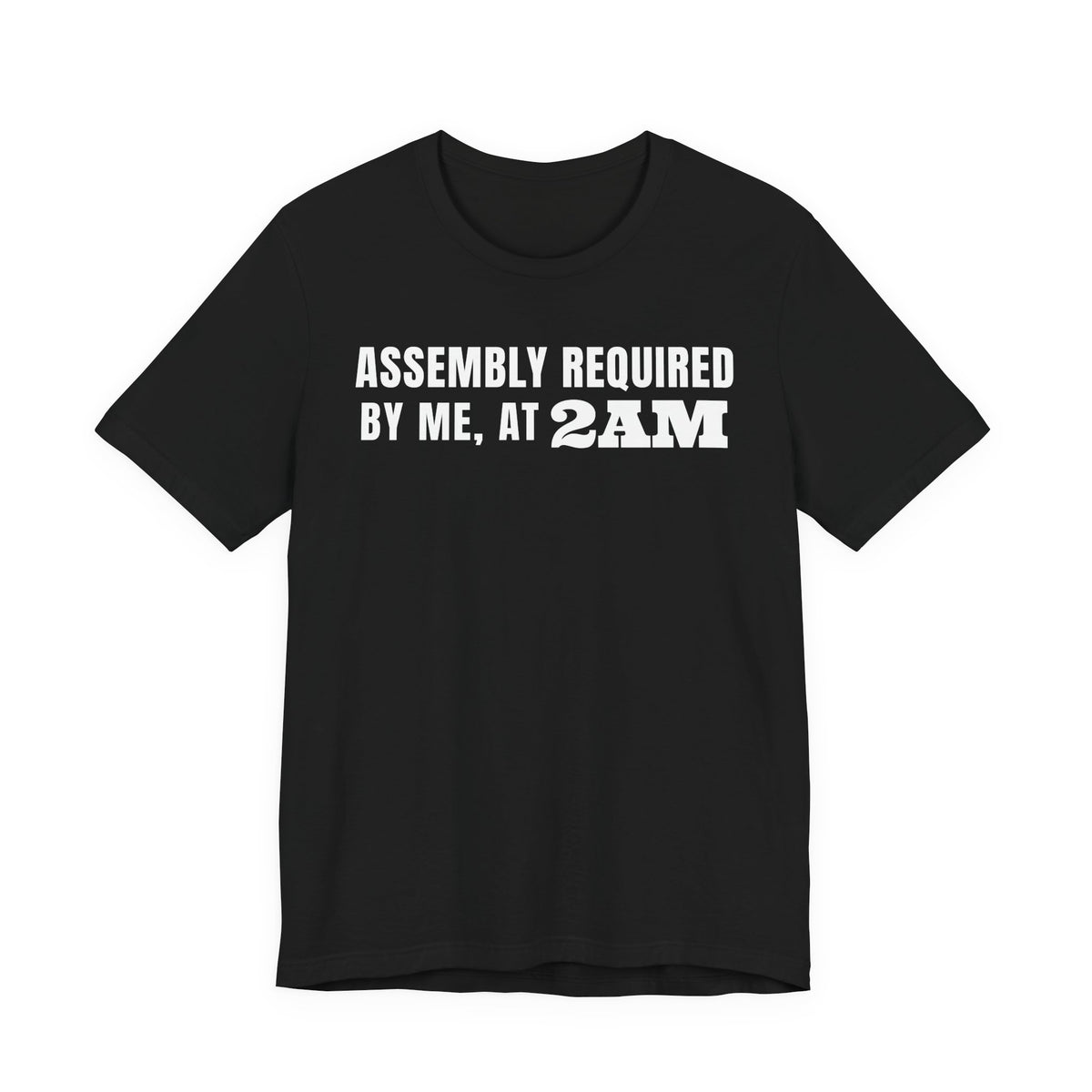 Front of a black t shirt with Assembly Required By Me, At 2AM printed in white