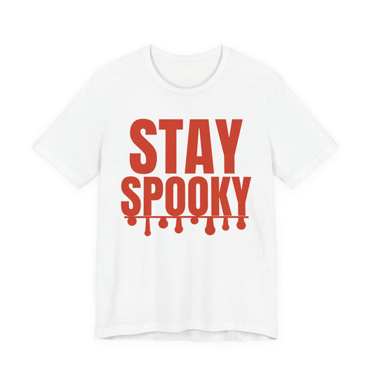 White oversized t shirt with Stay Spooky printed in red on the front