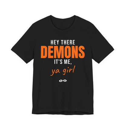 Black oversized t shirt with Hey There Demons, It's Me, Ya Girl printed in orange on the front