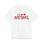 Front of a white t shirt with It's My Birthday Please Don't Make It A Thing printed in red