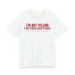 Front of a white t shirt with I'm Not Yelling I'm Projecting printed in red