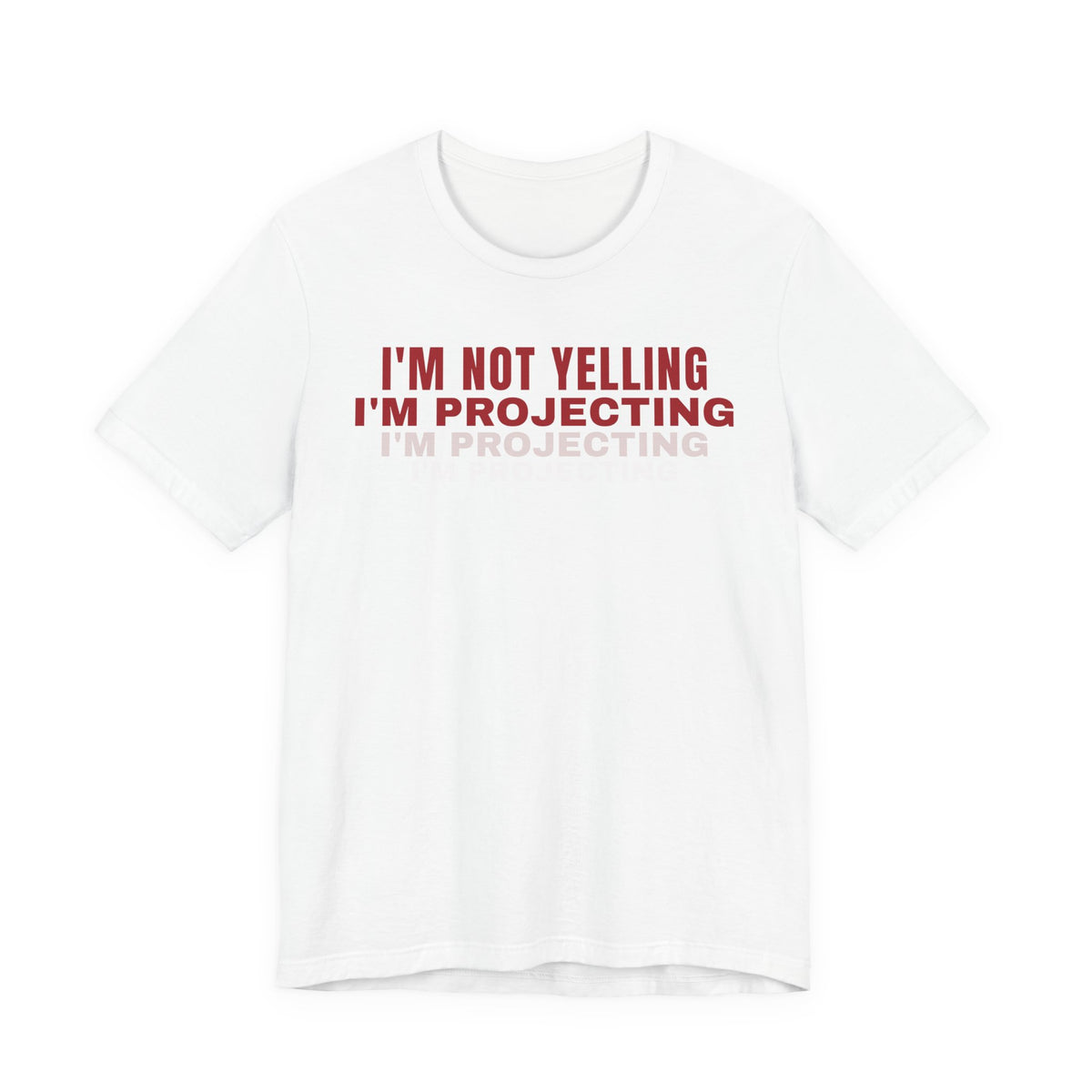 Front of a white t shirt with I'm Not Yelling I'm Projecting printed in red