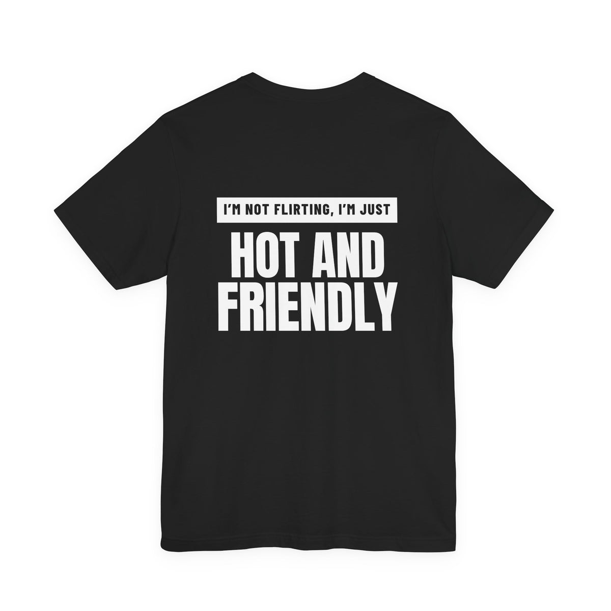 Woman from behind wearing a black oversized t shirt with "I'm Not Flirting, I'm Just Hot And Friendly" printed on the back, knockout bar design