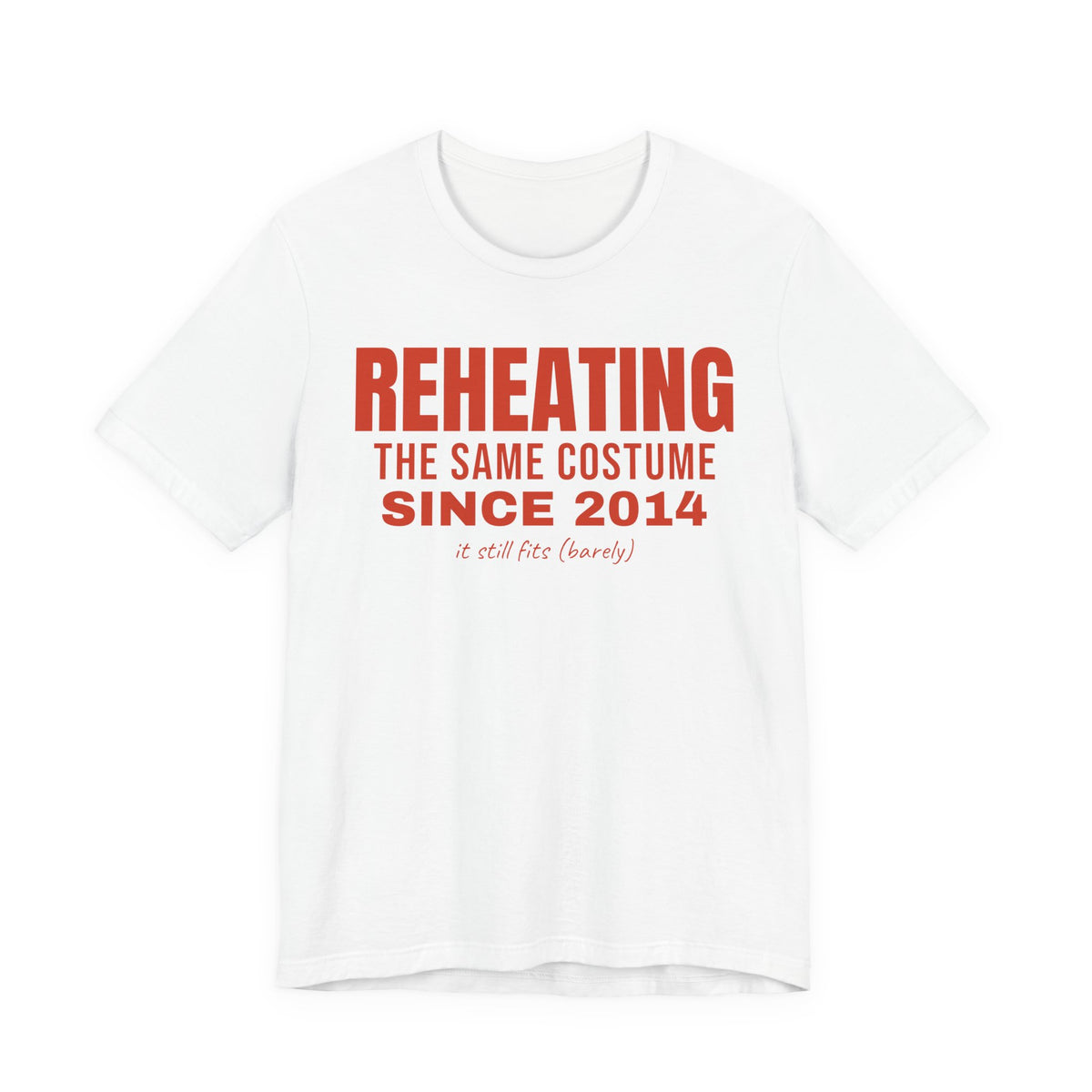 White oversized t shirt with Reheating The Same Costume Since 2014 printed in red on the front