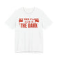 White oversized t shirt with My Red Flags Glow In The Dark printed in red on the front