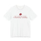 Front of a white t shirt with Not A Birthday Queen A Birthday Liability printed in red