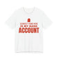 White oversized t shirt with Scariest Thing Here Is My Bank Account printed in red on the front