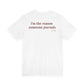 Woman from behind wearing a white oversized t shirt with "I'm The Reason Someone Journals" printed on the back