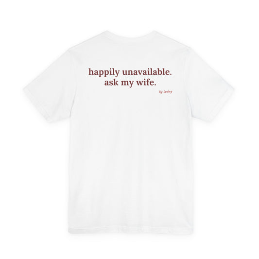 Woman from behind wearing a white oversized t shirt with "Happily Unavailable. Ask My Wife." printed on the back