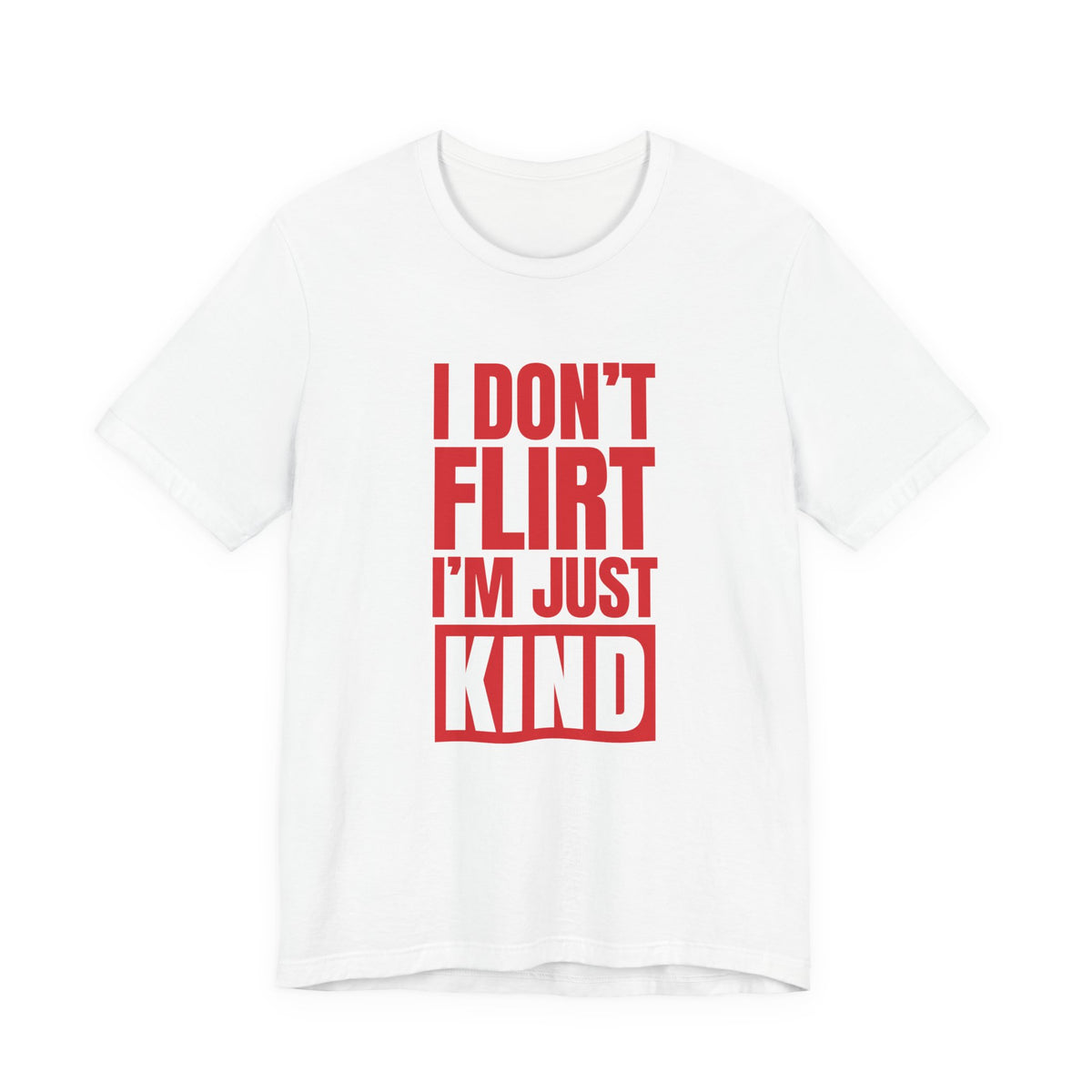 Woman wearing a white oversized t shirt with "I Don't Flirt, I'm Just Kind" printed on the front, knockout bar design