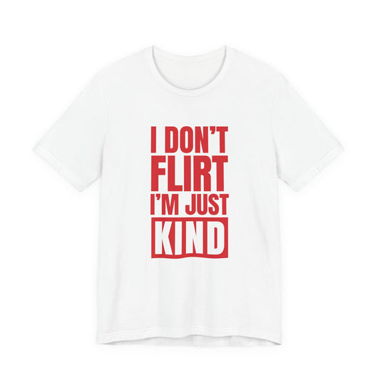 Woman wearing a white oversized t shirt with "I Don't Flirt, I'm Just Kind" printed on the front, knockout bar design