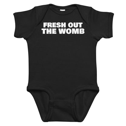 Black baby bodysuit with Fresh Out The Womb printed in white on the front