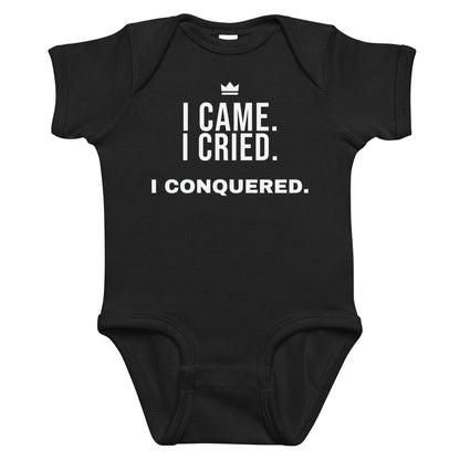 Black baby bodysuit with I Came. I Cried. I Conquered. printed in white on the front