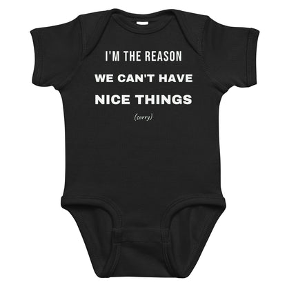 Black baby bodysuit with I'm The Reason We Can't Have Nice Things printed in white on the front