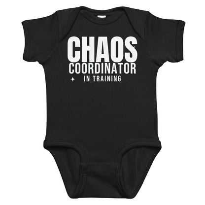 Black baby bodysuit with Chaos Coordinator In Training printed in white on the front