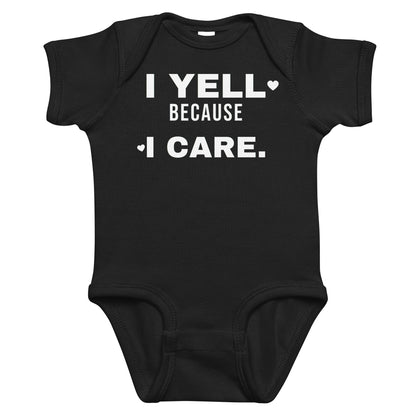 Black baby bodysuit with I Yell Because I Care printed in white on the front