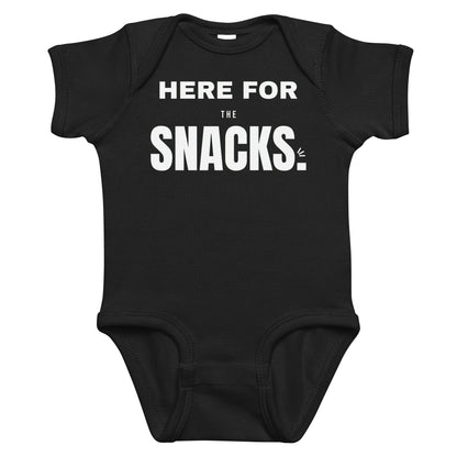 Black baby bodysuit with Here For The Snacks printed in white on the front