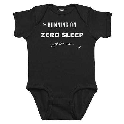 Black baby bodysuit with Running On Zero Sleep Just Like Mom printed in white on the front