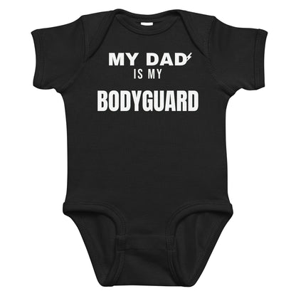 Black baby bodysuit with My Dad Is My Bodyguard printed in white on the front