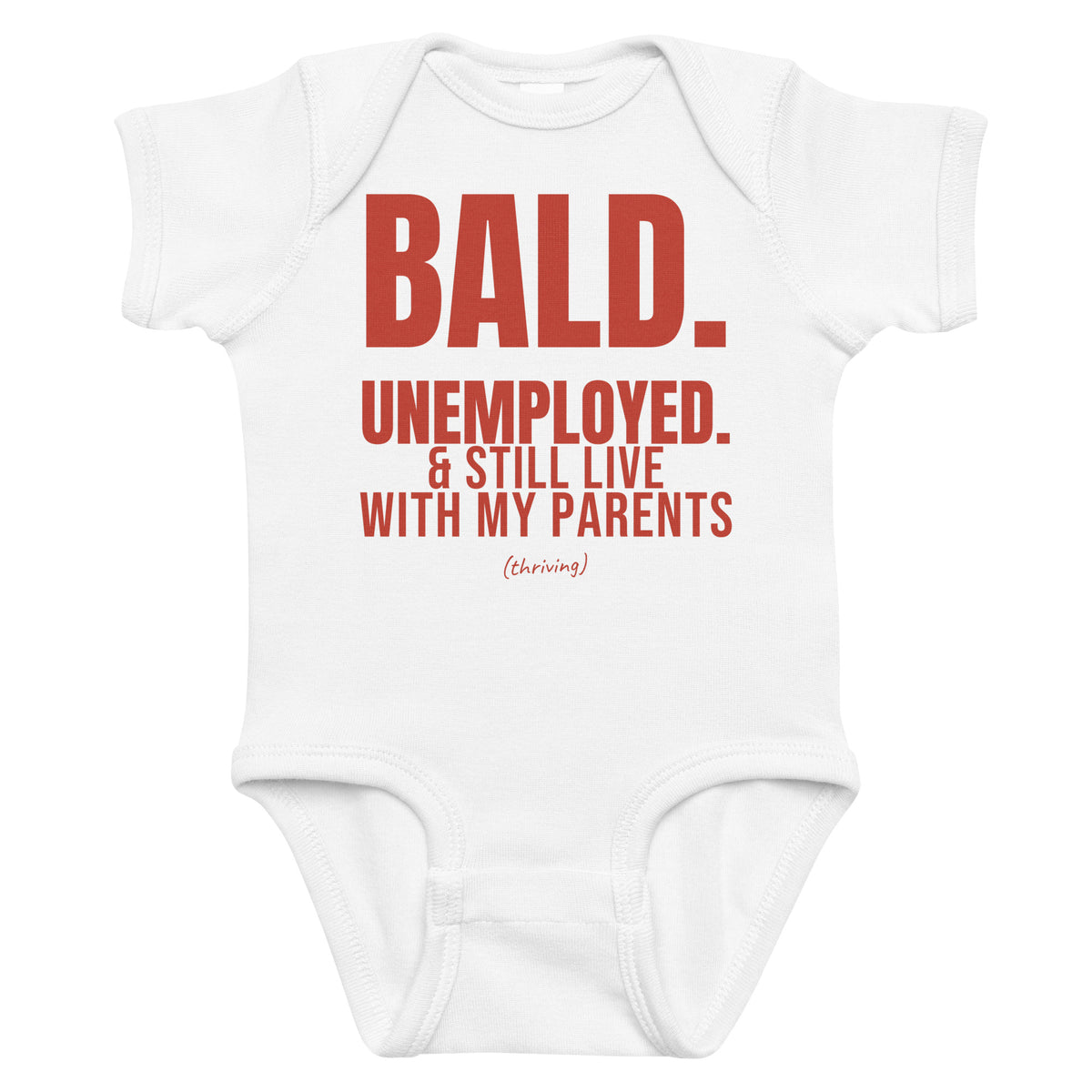 White baby bodysuit with Bald. Unemployed. & Still Live With My Parents printed in red on the front
